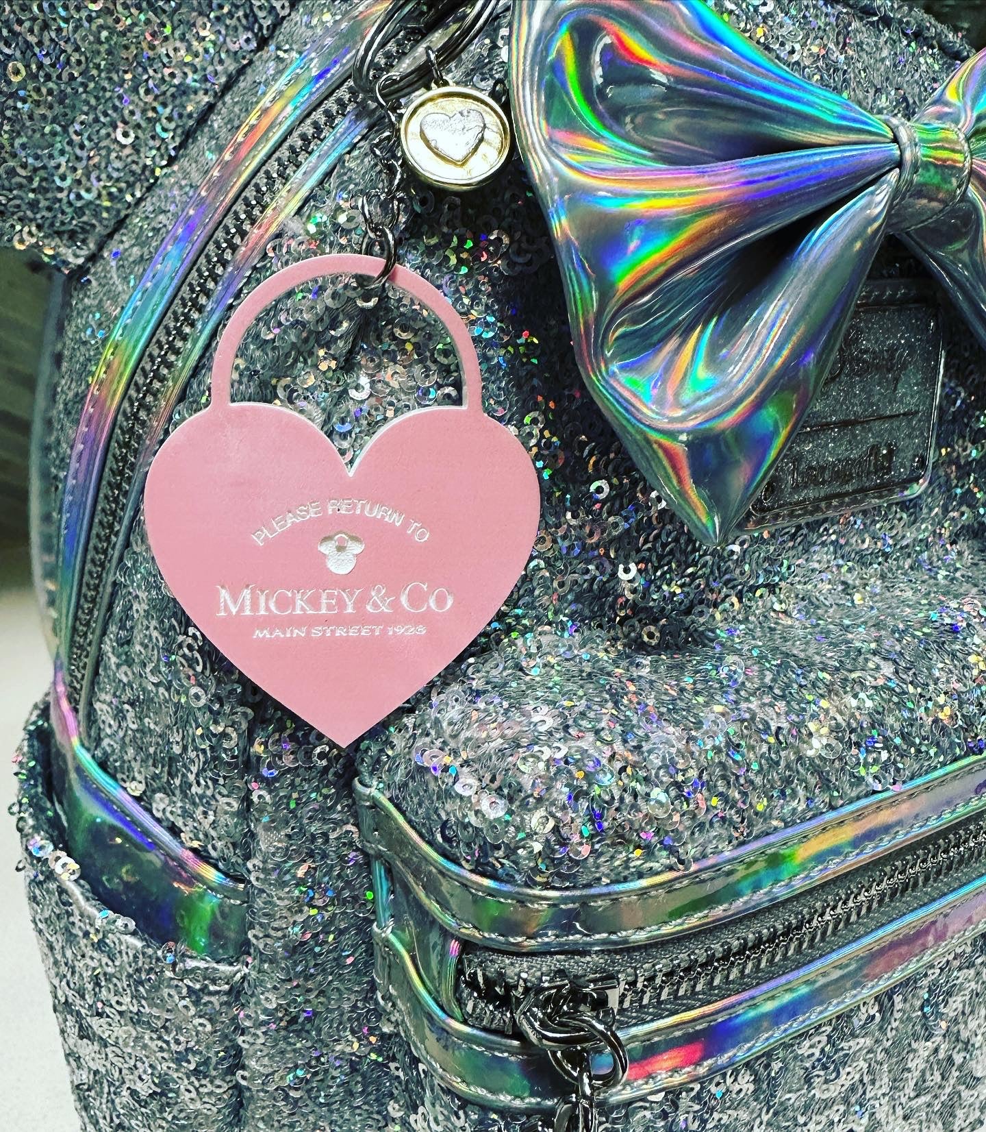 Please Return to Mickey & Co